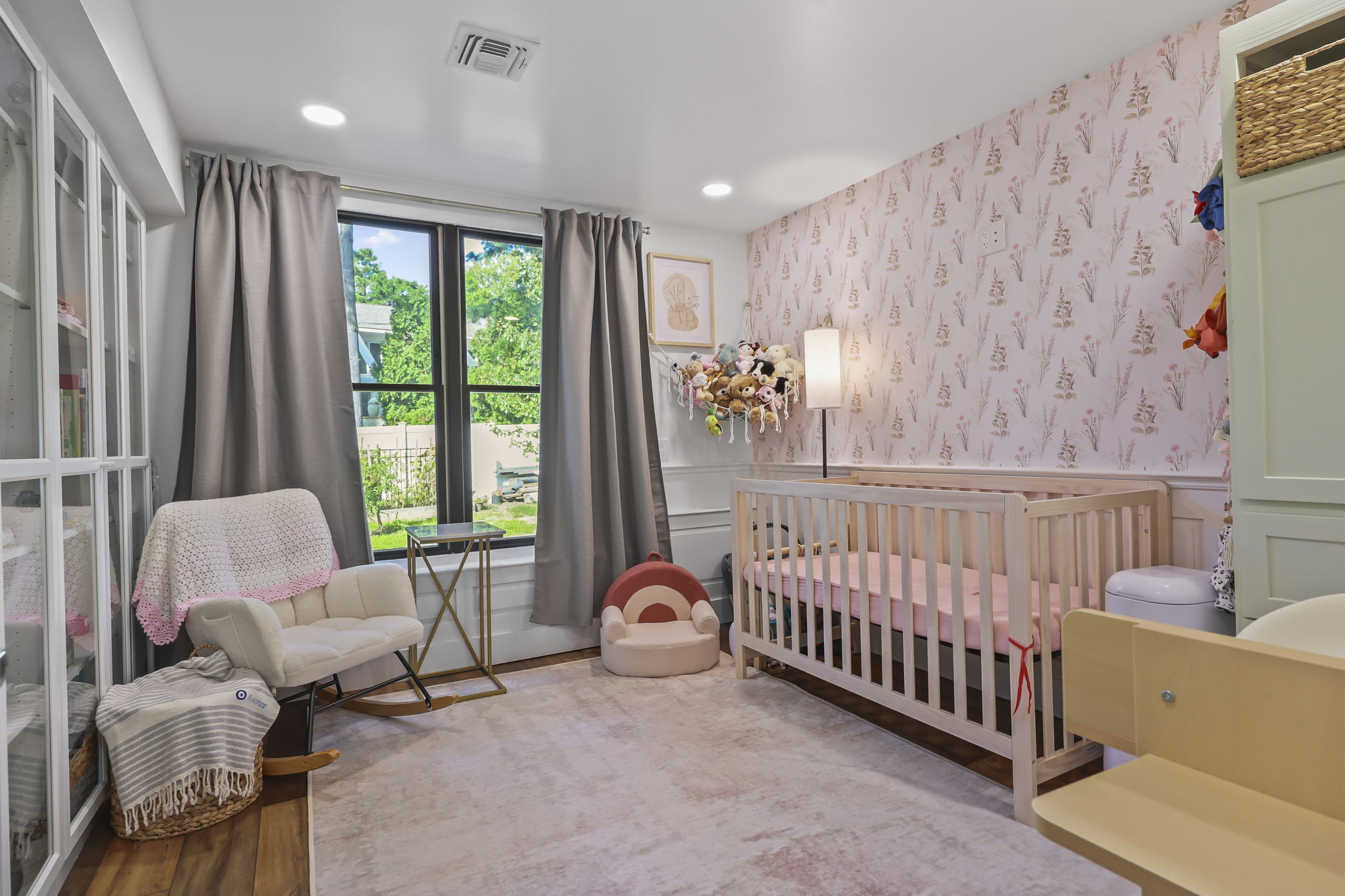Custom nursery with wallpaper accent